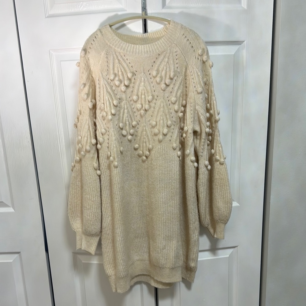 Elegant Cream Sweater with Textured Design